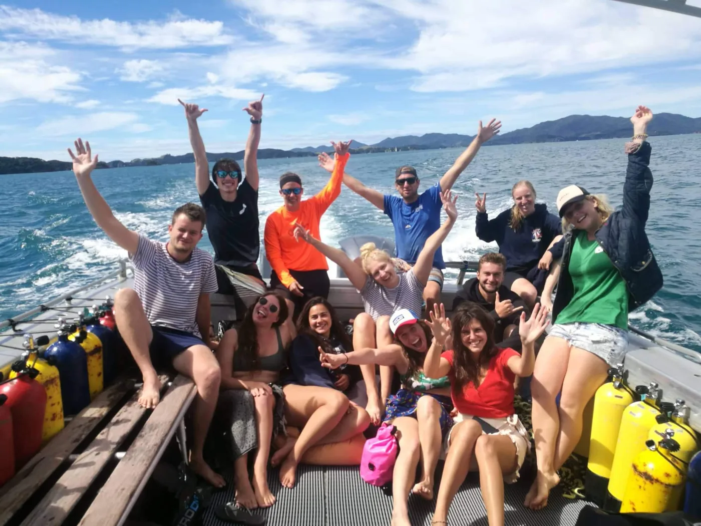 A happy group of divers on the Paihia Dive boat